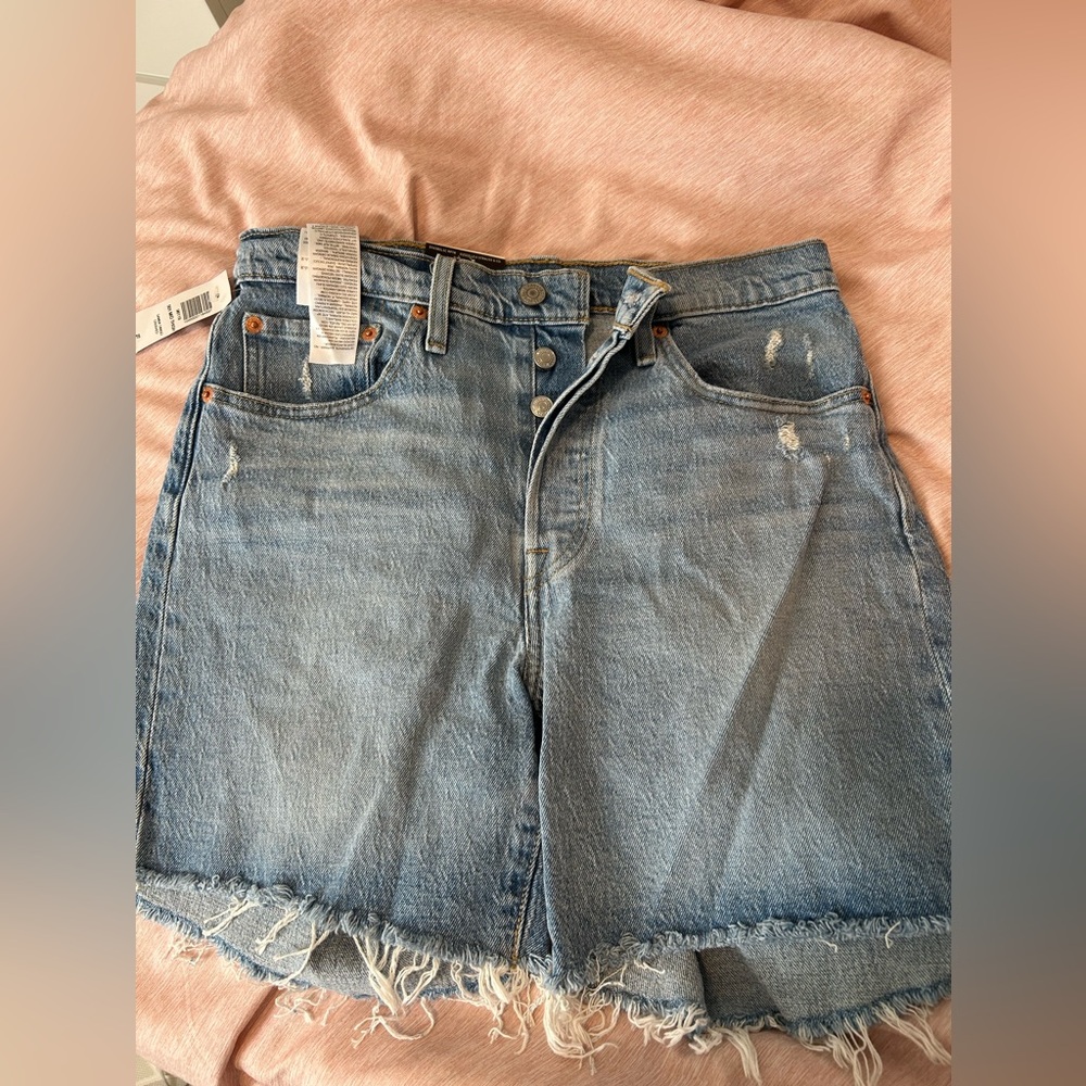 Levi’s 501 mid thigh denim shorts